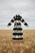 Coat floating in wheat field